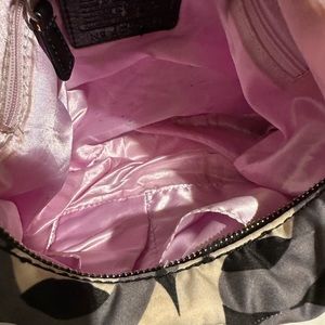 A very nice stylish small coach purse